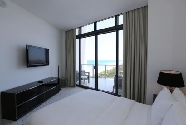 Bedroom with an ocean view at the W South Beach penthouse